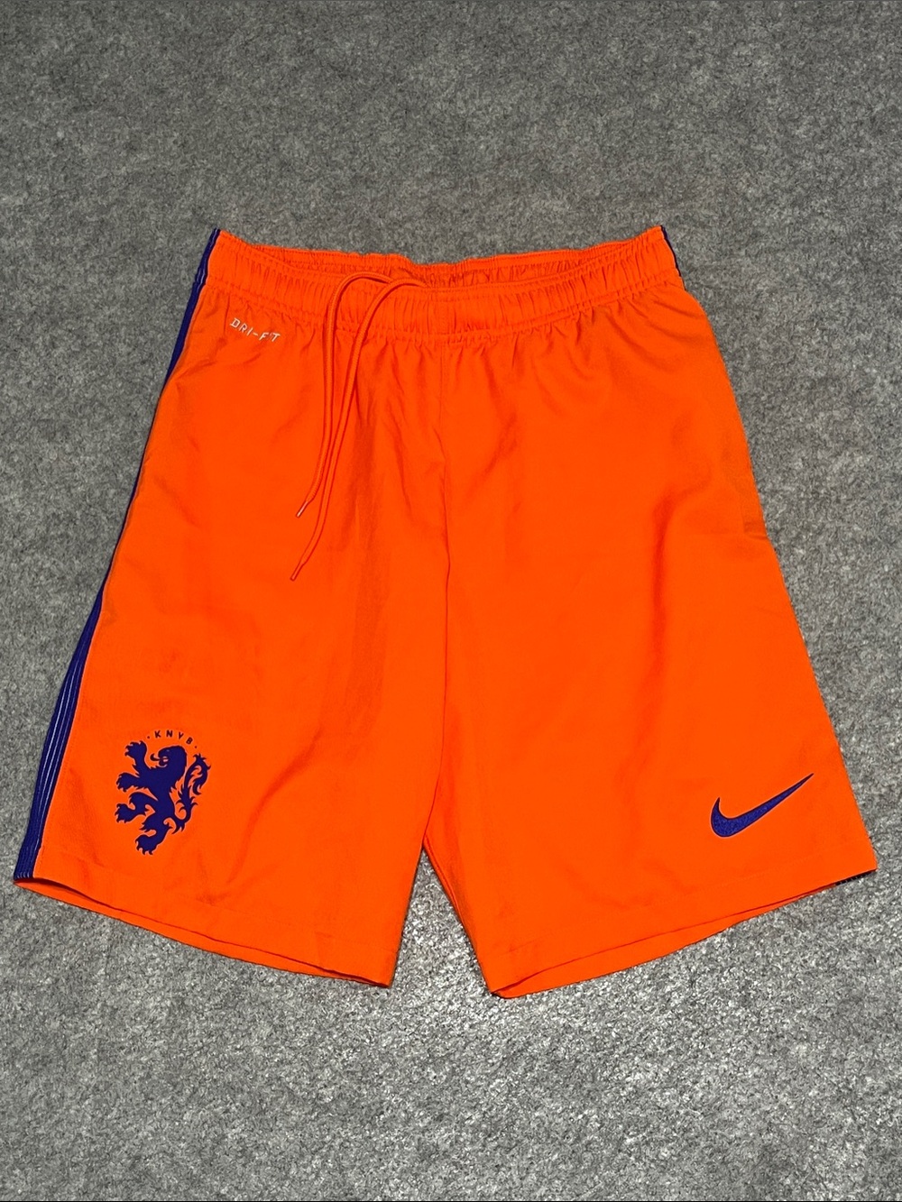 Nike Men's Bright Orange Athletic Shorts with Navy Accents